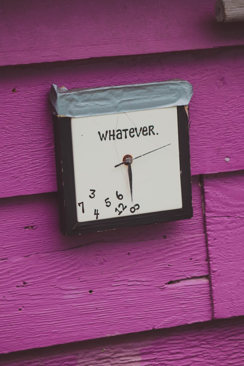 A clock that is on the side of a building