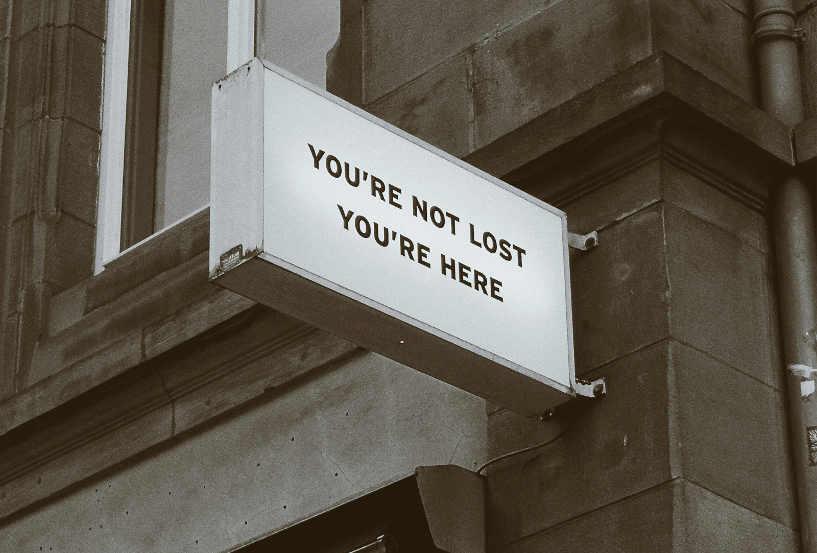 Outdoor signs showing "You're not lost you're here"